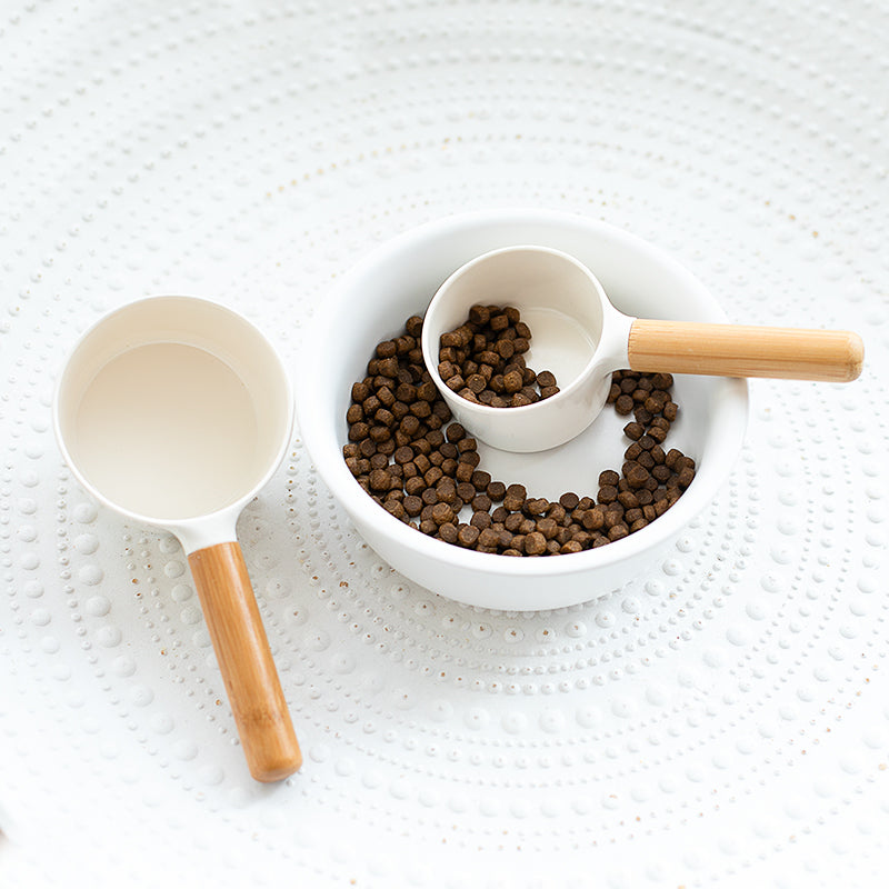 Bamboo Handle Pet Food Scoop, for dogs and cats.