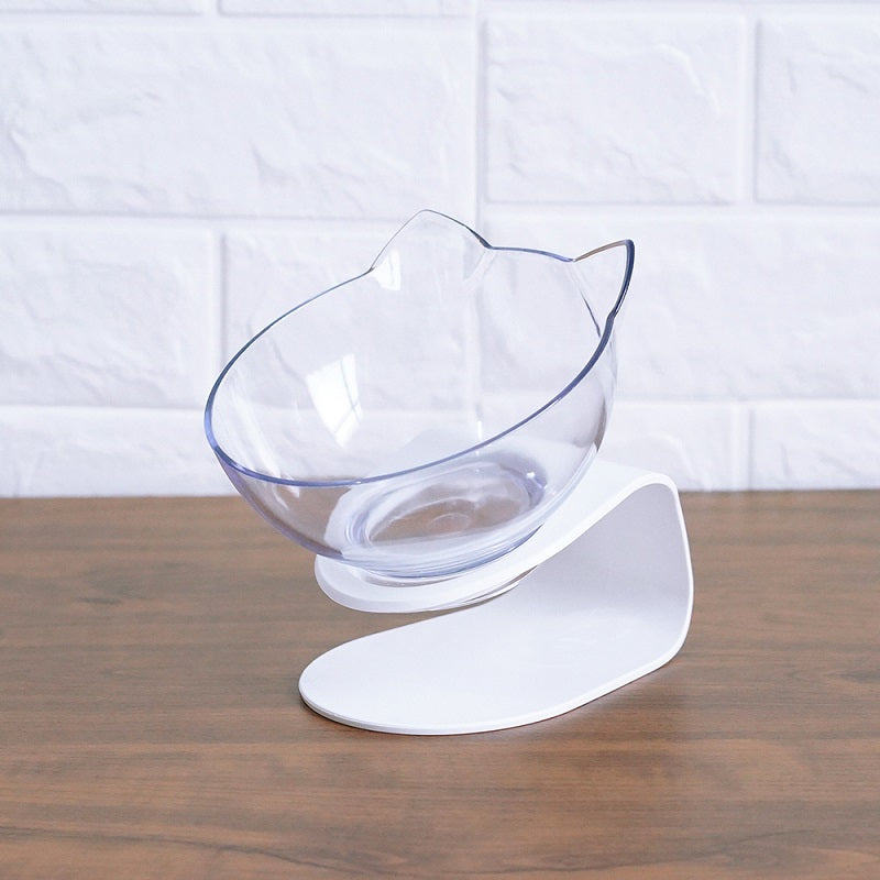 Kitten eating from elevated bowl with adjustable height accommodating growth and development
